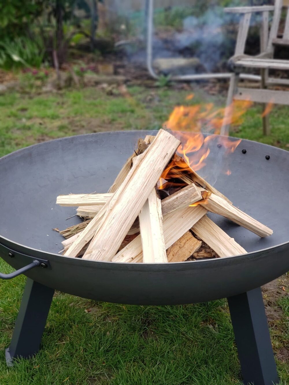 how to burn wood in a fire pit
