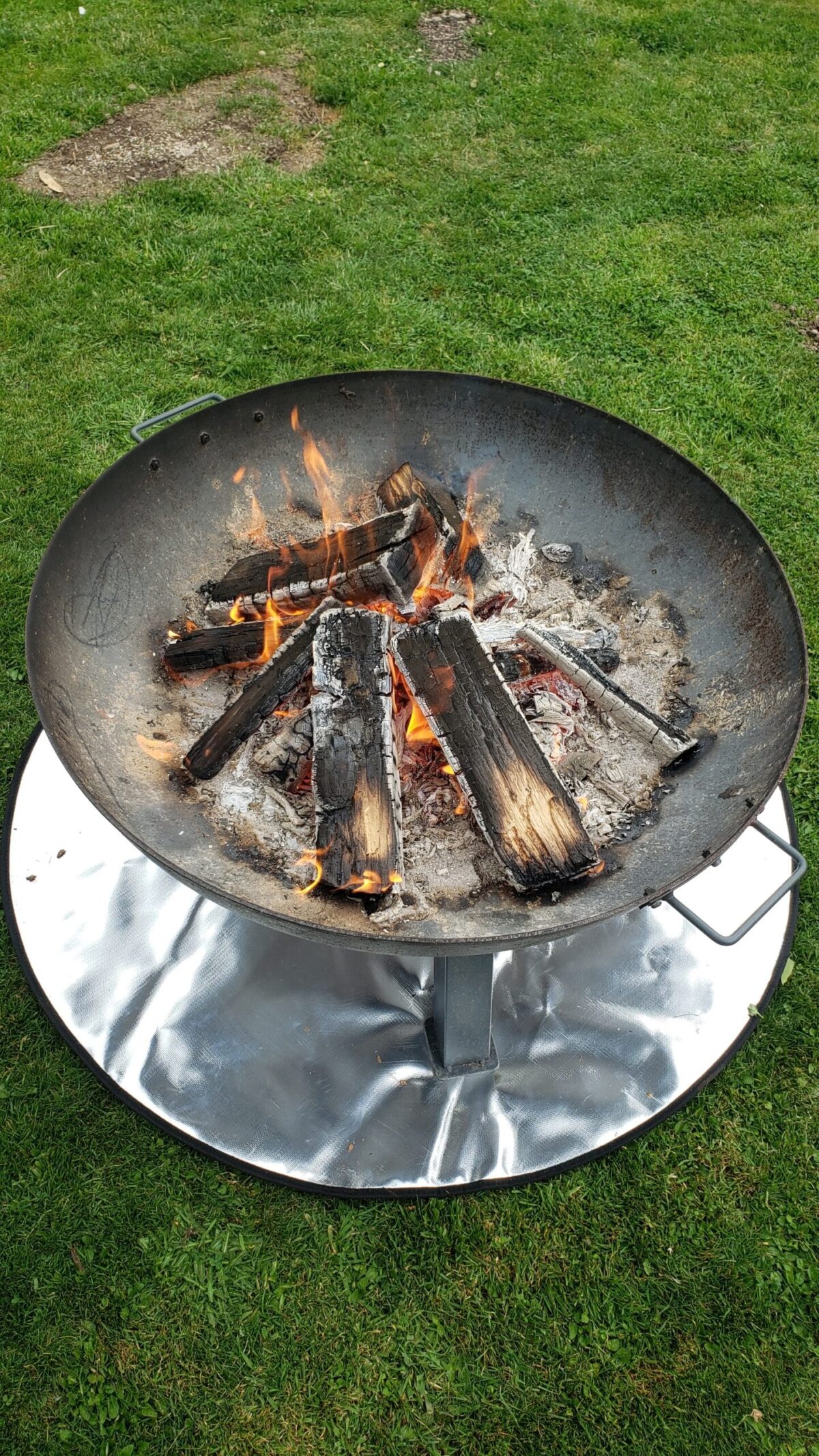 how to use a fire pit mat