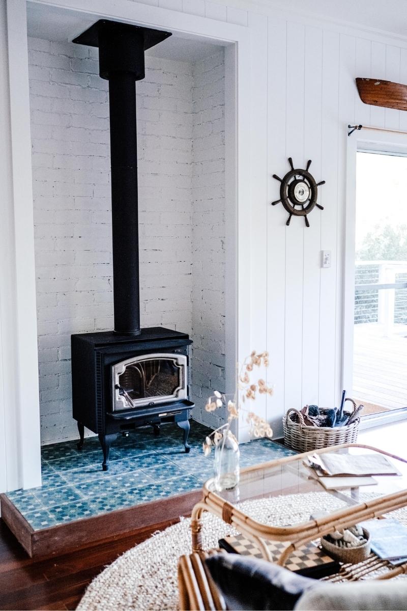 DIY wood stove surround heat shield with live edge turquoise inlay