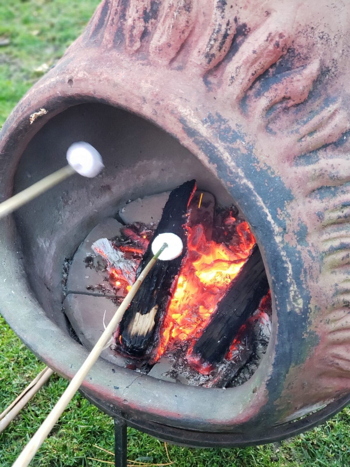 roasting marshmallow chiminea