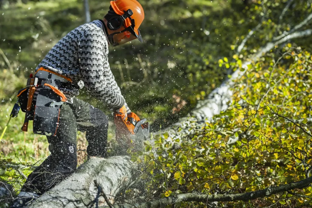 man using new husqvarna